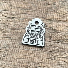 Load image into Gallery viewer, Personalised semi truck dog tag engraved with the name Rusty on brushed nickel silver, featuring a front-facing road train design.