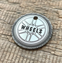 Load image into Gallery viewer, dog ID tag with car wheel design, personalised deep engraved pet ID tag in nickel silver, round tyre style tag for dogs and cats, made in Australia