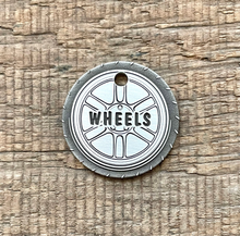 Load image into Gallery viewer, dog ID tag with car wheel design, personalised deep engraved pet ID tag in nickel silver, round tyre style tag for dogs and cats, made in Australia
