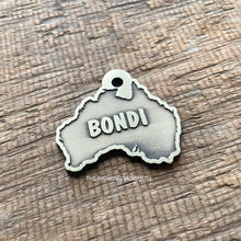 Load image into Gallery viewer, Dog ID tag shaped like Australia with the name Bondi engraved, personalised deep engraved metal pet tag with an Australian map design.