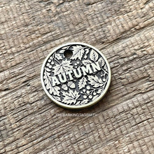 Load image into Gallery viewer, Dog ID tag with autumn leaves design and engraved name, personalised deep engraved metal pet tag for dogs and cats.