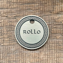 Load image into Gallery viewer, Dog ID tag with detailed Celtic knot border deep engraved on round metal tag, personalised engraved pet tag with the name Rollo.