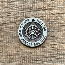 Load image into Gallery viewer, Personalised compass dog ID tag with engraved wander quote and paw design, durable metal pet tag for outdoor and travel dogs