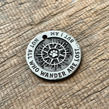 Load image into Gallery viewer, compass dog ID tag with paw design and not all who wander are lost quote deeply engraved into metal, personalised adventure pet tag