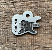 Load image into Gallery viewer, Dog ID tag shaped like an electric guitar with deep engraved details and the name Hendrix, personalised engraved metal pet tag for music lovers.