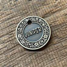 Load image into Gallery viewer, Dog ID tag with floral flower border design and engraved name Juniper, personalised deep engraved metal pet tag for dogs.