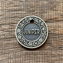 Load image into Gallery viewer, Dog ID tag with floral flower border design and engraved name Juniper, personalised deep engraved metal pet tag for dogs.