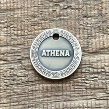 Load image into Gallery viewer, Dog ID tag with Greek key border and engraved name Athena, personalised deep engraved metal pet tag for dogs and cats.
