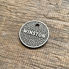 Load image into Gallery viewer, Dog ID tag with ornate scroll pattern and the name Winston engraved, personalised deep engraved metal pet tag with elegant vintage design.