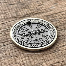 Load image into Gallery viewer, Personalised Viking compass dog ID tag with engraved Vegvisir Norse symbol and Celtic knot border in brushed silver metal on rustic wood background