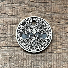 Load image into Gallery viewer, Dog ID tag with Viking Tree of Life design deep engraved on round metal tag, personalised engraved pet tag featuring the name Freyja.
